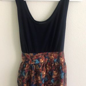 Adjustable fit n’flair Dress with pockets.
